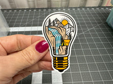 Load image into Gallery viewer, Sticker | 75E | Adventure Lightbulb | Waterproof Vinyl Sticker | White | Clear | Permanent | Removable | Window Cling | Glitter | Holographic