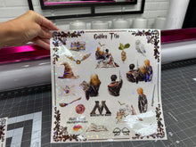 Load image into Gallery viewer, Sticker Sheet Golden Trio 12 x 12 inch Sheet with Various Size Stickers