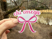 Load image into Gallery viewer, Sticker | Chi-O | Chi Omega Pink Bow | Waterproof Vinyl Sticker | White | Clear | Permanent | Removable | Window Cling | Glitter | Holographic