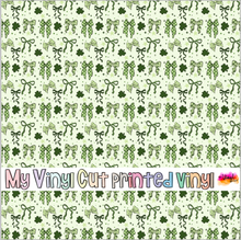 Load image into Gallery viewer, Printed Vinyl, HTV &amp; Waterslide Green Lucky Coquette Bows Pattern 12 x 12 inch sheet