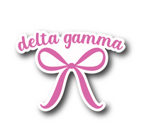 Load image into Gallery viewer, Sticker | DG | Delta Gamma Pink Bow | Waterproof Vinyl Sticker | White | Clear | Permanent | Removable | Window Cling | Glitter | Holographic