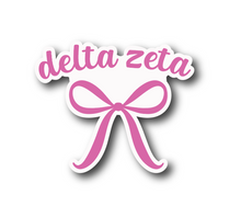 Load image into Gallery viewer, Sticker | DZ | Delta Zeta Pink Bow | Waterproof Vinyl Sticker | White | Clear | Permanent | Removable | Window Cling | Glitter | Holographic